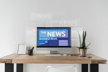 Computer with news on screen