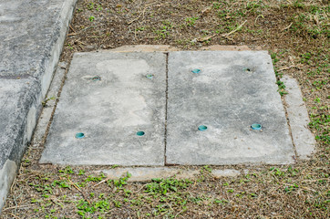 Concrete cover of the drainage system.