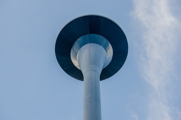 Water tank storage on sky background.