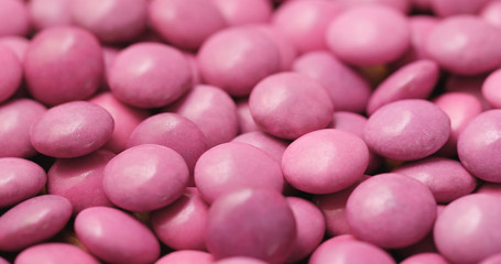 Obraz na płótnie Canvas Chocolate bean in pink