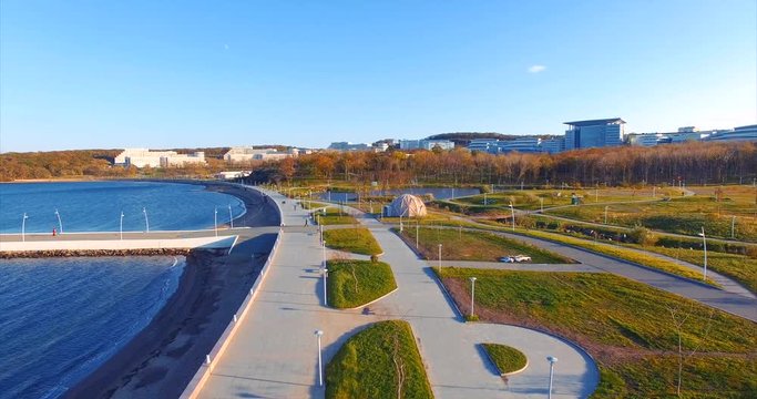 Embankment and pier. Territory of Far Eastern Federal University. Park and students. Aerial view. Vladivostok, Russia.