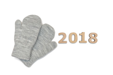 2018 wooden number with gray winter gloves isolated over white background