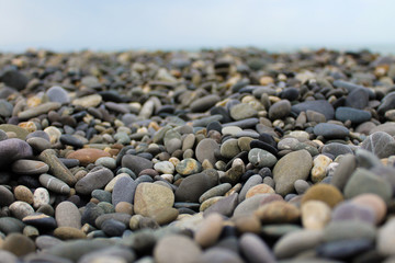 Pebbles close-up against the sky.