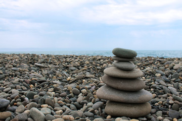 Pinnacle of sea pebbles on the beach.