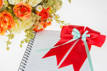 Rose flower plastic and Red ribbons  with tails