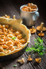 Homemade and rustic tarts made of wild mushrooms and herbs