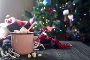 Enamel cup of hot cocoa with marshmallows