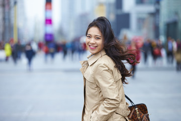 Obraz premium One beautiful young asian woman in the street