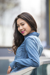 One beautiful young asian woman in the street