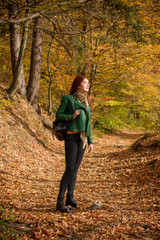 Naklejka premium Gorgeous sexy young lady walk at nature park. Woman wearing casual nice style. Sweet women with fashionable figure rest on the mountains, harmony mood
