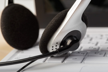 headset on keyboard computer laptop