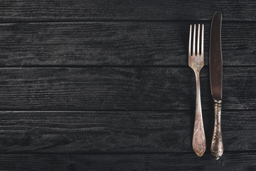 Cutlery. Vintage On a wooden background. Top view. Free space for text.