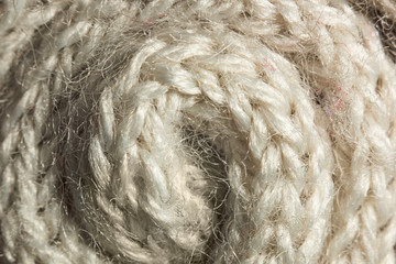 Twisted braided woolen fiber background macro