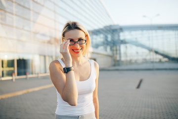 Close up portrait of a professional business woman in glasses outdoor