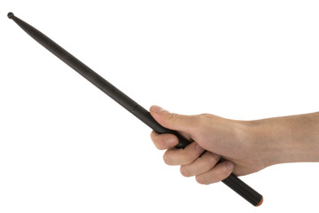 black drumstick for playing in the right hand