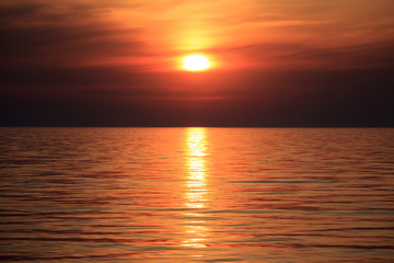 Sea Sunrise with clouds and waves
