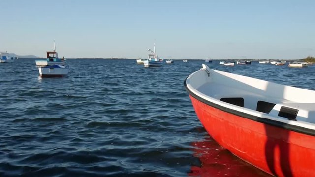 footage at the sunset of the stagnone park near trapani and marsala in sicily in backlight with moored boats