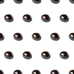 Seamless pattern from black olives isolated on white background