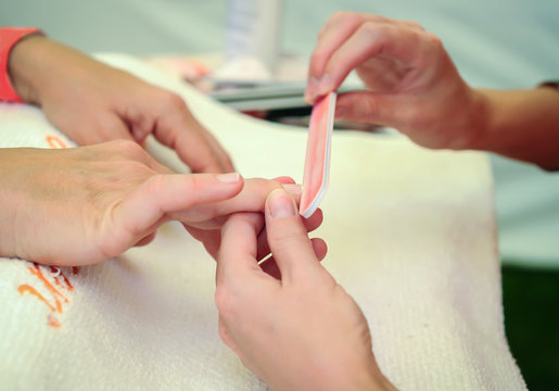 woman nail manicure in salon