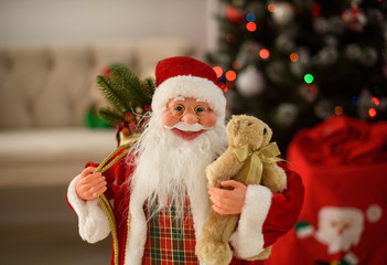 A beautiful living room decorated for Christmas with Christmas tree and presents under it