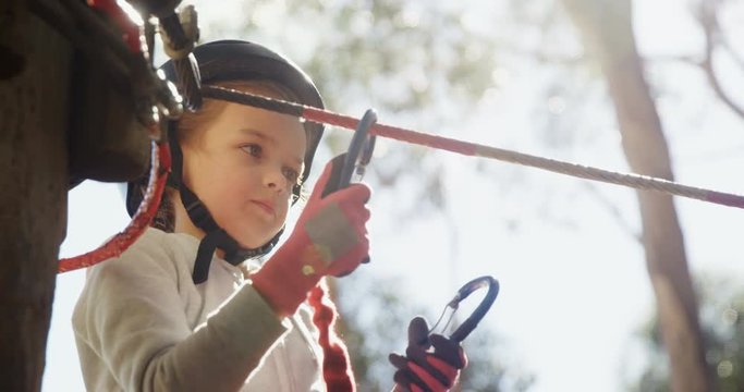 Girl ziplining 