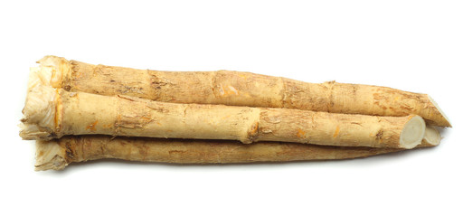 horseradish root with parsley isolated on white background