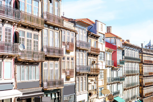 View on the beautiful old building facades with famous portuguese tiles on the street in the old town of Porto city, Portugal