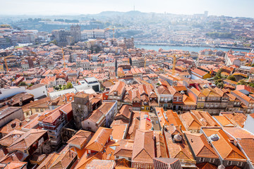 Fototapeta na wymiar Aerial wideangle cityscape view on the old town of Porto city during the sunny day in Portugal