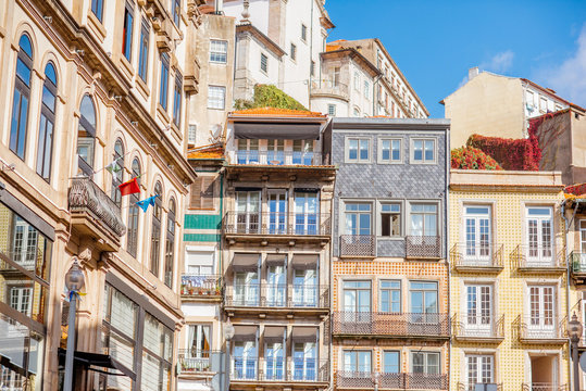 View on the beautiful old building facades on the street in the old town of Porto city, Portugal