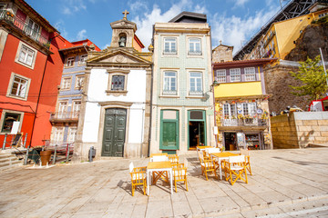 View on the Ribeira promenade with beautiful buildings and Lada chappel in Porto city, Portugal