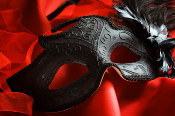carnival venetian mask on a bright red background