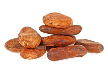 Heap of raw cocoa beans isolated on a white background