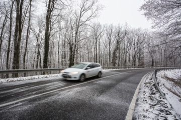 Obraz na płótnie Canvas snowy road at wintertime