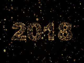 Golden snowflakes falling on a black background form the number 2018