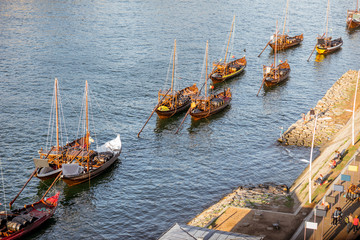 Obraz premium Top view on the old portuguese boats on the Douro river in Porto city, Portugal
