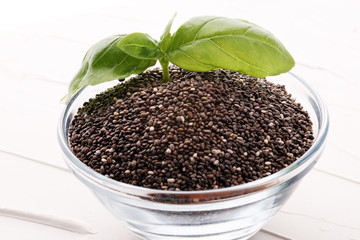 Healthy Chia seeds in a glass bowl on the table