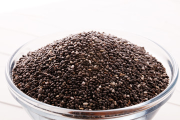 Healthy Chia seeds in a glass bowl on the table