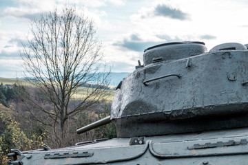 world war II tanks on a field as a battle monument