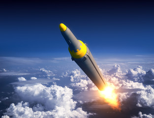 Naklejka na ściany i meble North Korean Ballistic Rocket In The Blue Sky