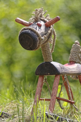 wooden horse on grass