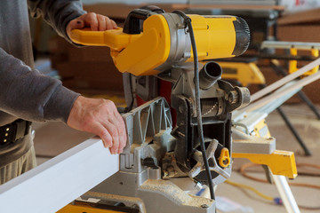Circular Saw. Carpenter Using Circular Saw for wood