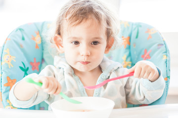 The girl is eating very fast