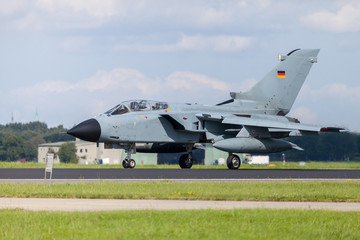 german jet fighter drives on military airbase - obrazy, fototapety, plakaty