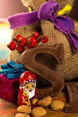 Traditional Dutch Saint Nicolas celebration with presents for children in December, Saint Nicolas  gift bag and chocolate letters