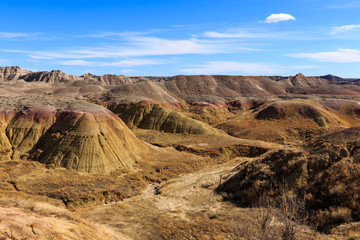 Strange colors line the layers of rock in Badlands National Park, South Dakota