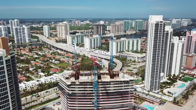 aerial picture of highrise buildings ,financial corporations ,residental houses on the ocean shore sunny isles beach,miami