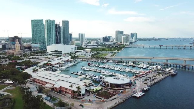 aerial view on miami harbor with yachts and walking boats on the background of skyscrapers and museum of science,miami