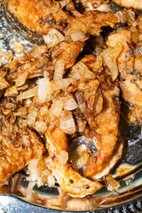Dish from pieces of fried river fish for dinner in Russia