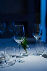 Empty glasses wine in restaurant. Glass water. Dish spoon fork on table