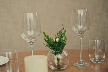 Empty glasses wine in restaurant. Glass water. Dish spoon fork on table